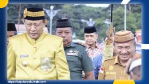 Kunjungan Perdana ke Pohuwato, Bupati Saipul Mbuinga Sambut Gubernur Gusnar Ismail dengan Adat Mopotilolo