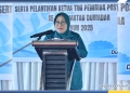 Ketua TP PKK Kabupaten Pohuwato Ny Selvi Mbuinga Monoarfa, saat memberikan sambutan pada pengukuhan TP PKK dan Tim Pembina Posyandu Desa se-Kecamatan Duhiada'a, di aula kantor Camat Duhiada'a, Kamis (20/11/2025). (Foto : Kris)
