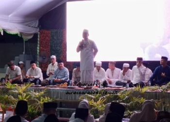 Dandim 1313/Phw Letkol Arm Fiat Suwandana saat menghadiri Tabligh Akbar peringatan Isra Mi’raj Nabi Muhammad SAW 27 Rajab 1447 Hijriah yang digelar di Masjid As-Syahadah, Desa Bumbulan, Kecamatan Paguat, Kabupaten Pohuwato, Minggu (18/01/2026) malam.