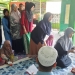 Kerukunan Persaudaraan Haji Ar Muzna Kabupaten Pohuwato 2025 saat menyalurkan bantuan di Yayasan Rumah Yatim 'Sumayyah', di Kecamatan Marisa, Senin (16/02/2026).